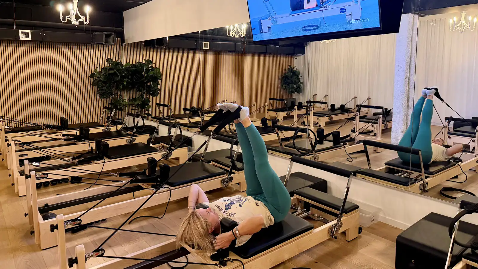 Virtual Reformer Pilates class in progress at Sorrento Reformer studio
