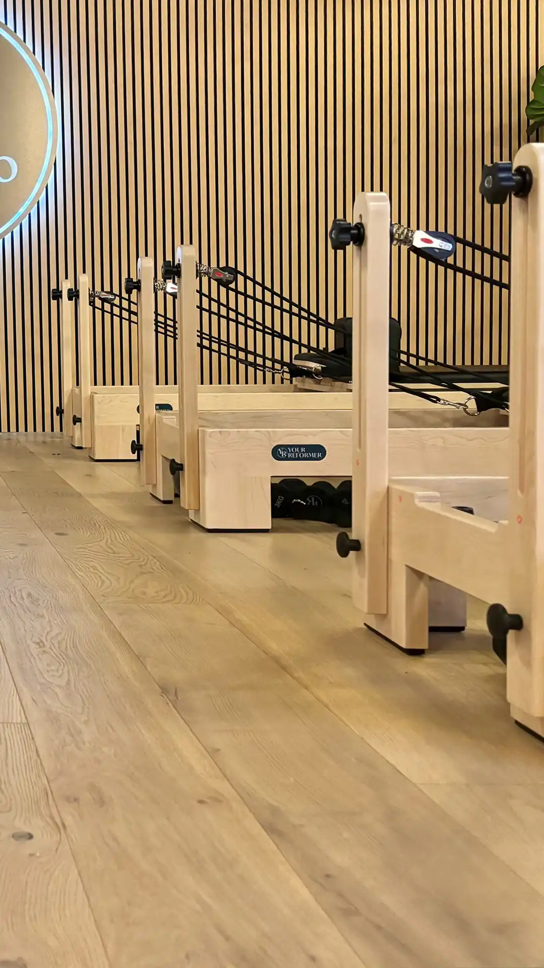 Woman practicing Reformer Pilates at Sorrento Reformer studio